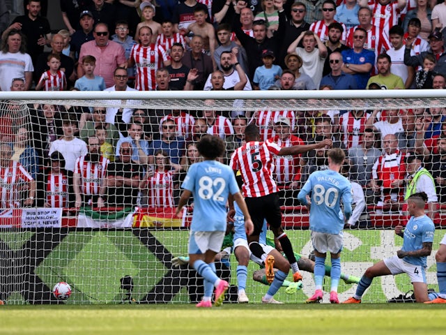 Ethan Pinnock scores for Brentford against Manchester City on May 28, 2023