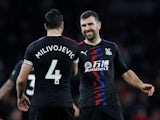 Crystal Palace's Luka Milivojevic and James McArthur celebrate after the match on October 27, 2019