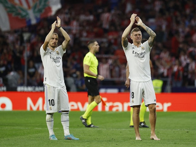 Real Madrid's Luka Modric and Toni Kroos celebrate after the match on September 18, 2022
