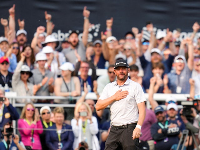 Michael Block acknowledges the fans on the 18th green during the final round of the PGA Championship golf tournament at Oak Hill Country Club on May 21, 2023