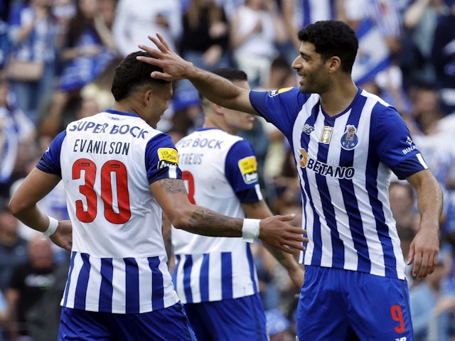 FC Porto's Evanilson celebrates scoring their third goal with FC Porto's Mehdi Taremi on May 27, 2023
