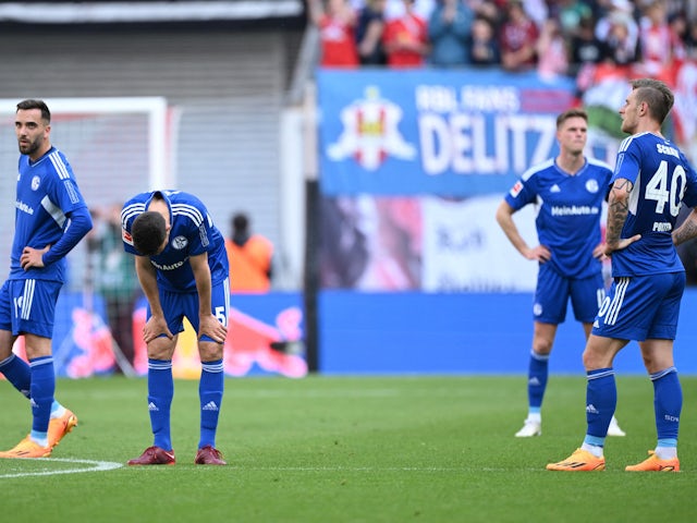 Schalke 04's Marcin Kaminski and Sebastian Polter looks dejected during the match on May 27, 2023