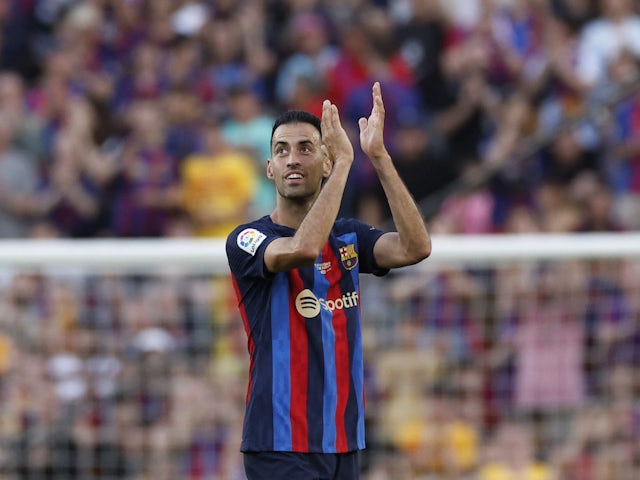 Barcelona's Sergio Busquets applauds fans as he is substituted during his last match for FC Barcelona at Camp Nou on May 28, 2023