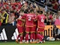 St Louis City SC midfielder Eduard Lowen (10) celebrates with teammates after scoring a goal on May 28, 2023