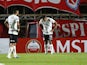 Corinthians' Murillo with teammates look dejected after the match on May 26, 2023