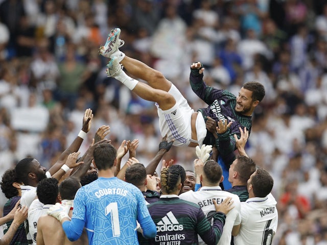 Real Madrid players throw Eden Hazard in the air after the match on June 4, 2023