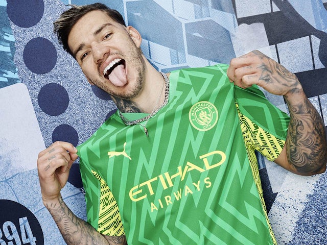 Ederson in Man City's 2023-24 home kit