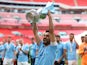 Manchester City's Ilkay Gundogan celebrates with the trophy after winning the FA Cup on June 3, 2023