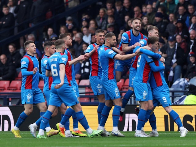 Inverness Caledonian Thistle's Billy McKay celebrates with teammates after scoring their first goal on April 29, 2023