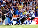 Sheffield Wednesday's Josh Windass celebrates scoring their first goal on May 29, 2023