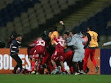 Nublense's Jorge Henriquez celebrates scoring their first goal with teammates on May 26, 2023