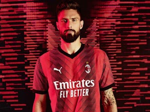 Pictured: Olivier Giroud models AC Milan 2023-24 home kit - Sports Mole