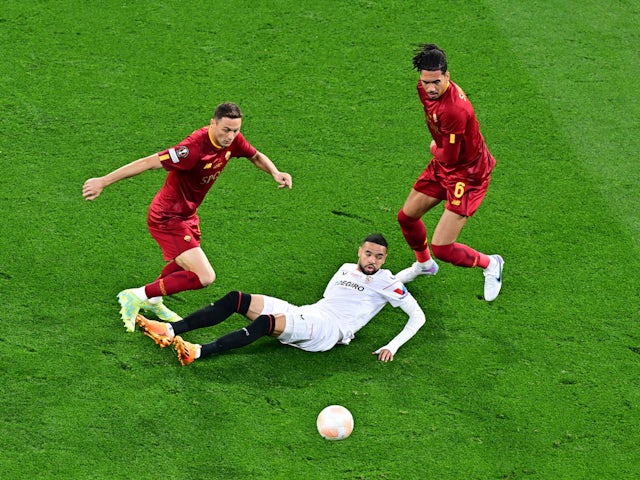 Sevilla's Youssef En-Nesyri in action with Roma's Chris Smalling and Nemanja Matic on May 31, 2023