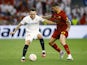 Sevilla's Lucas Ocampos in action with Roma's Leonardo Spinazzola on May 31, 2023