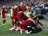 Roma's Paulo Dybala celebrates with teammates after scoring against Sevilla on May 31, 2023