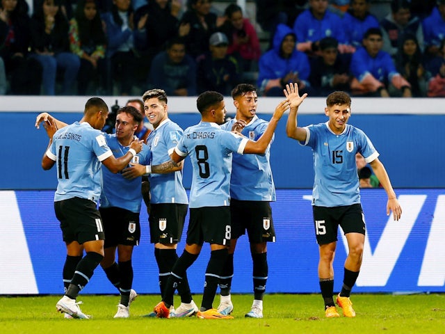 Uruguay Under-20s' Anderson Duarte celebrates scoring their first goal with teammates on June 4, 2023