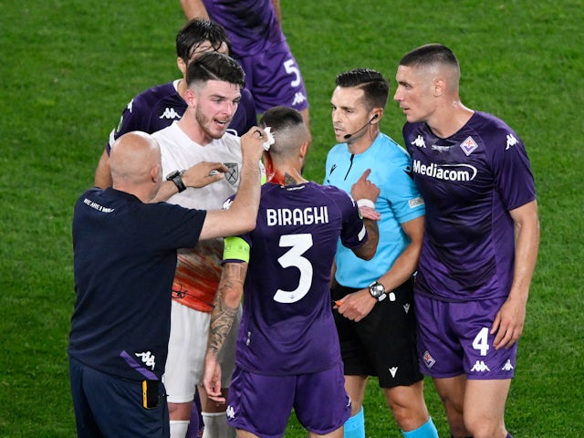 Fiorentina's Cristiano Biraghi receives medical attention after sustaining a head injury on June 7, 2023