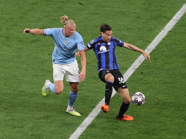 Inter Milan's Matteo Darmian in action with Manchester City's Erling Braut Haaland on June 10, 2023