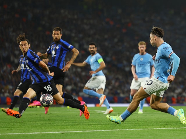 Manchester City's Jack Grealish in action with Inter Milan's Matteo Darmian on June 10, 2023