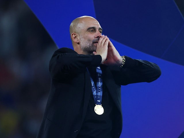 Manchester City manager Pep Guardiola celebrates after winning the Champions League on June 10, 2023