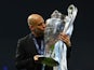 Manchester City manager Pep Guardiola celebrates with the trophy after winning the Champions League on June 10, 2023