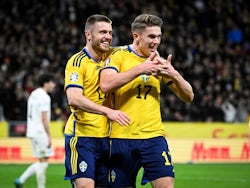 Sweden's Viktor Gyokeres celebrates scoring their third goal with Mattias Svanberg on March 27, 2023