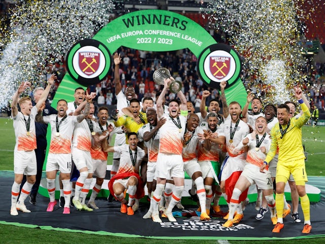 West Ham United's Declan Rice lifts the trophy as he celebrates with teammates after winning the Europa Conference League on June 7, 2023