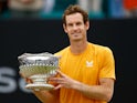 Andy Murray poses with the trophy after winning the Nottingham Open on June 18, 2023)