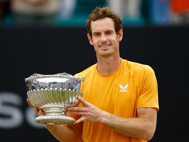 Andy Murray poses with the trophy after winning the Nottingham Open on June 18, 2023)