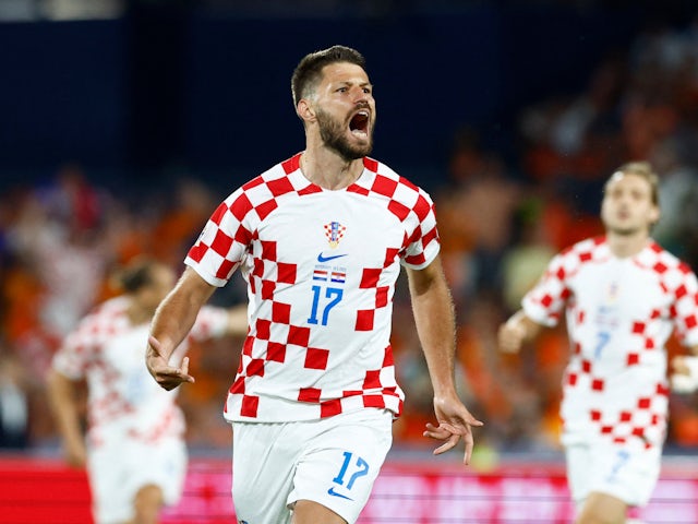 Bruno Petkovic celebrates scoring for Croatia on June 14, 2023