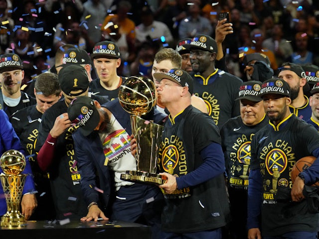 The Denver Nuggets celebrate winning the NBA title on June 12, 2023