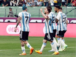 Argentina's Lionel Messi celebrates scoring their first goal with teammates on June 15, 2023