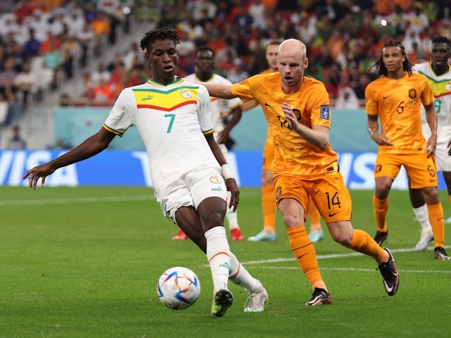 Senegal's Nicolas Jackson in action with Netherlands' Davy Klaassen on November 21, 2022