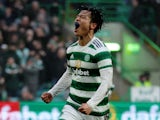 Celtic's Reo Hatate celebrates scoring their third goal on February 18, 2023
