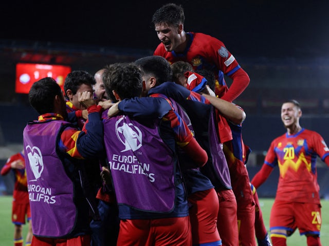 Andorra players celebrate after Albert Rosas scores their first goal on June 19, 2023