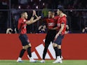 Athletico Paranaense's Vitor Roque celebrates scoring their first goal with teammates on June 21, 2023