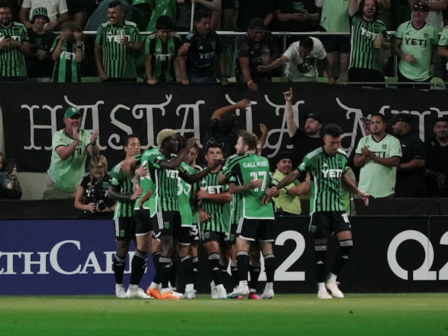 Austin FC midfielder Ethan Finlay (13) celebrates with teammates after scoring a goal on June 21, 2023