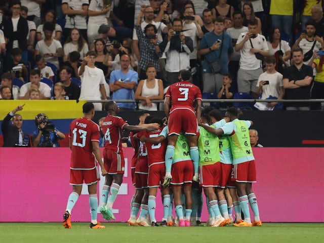 Colombia's Juan Cuadrado celebrates scoring their second goal with teammates on June 20, 2023