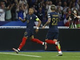 France's Kylian Mbappe celebrates scoring their first goal on June 19, 2023