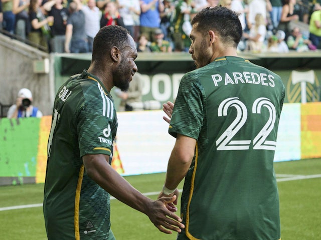 Portland Timbers forward Franck Boli (7) celebrates with midfielder Cristhian Paredes (22) after scoring a goal on June 21, 2023