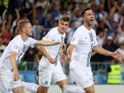 Slovenia's Andraz Sporar celebrates scoring their first goal with Zan Karnicnik on June 19, 2023