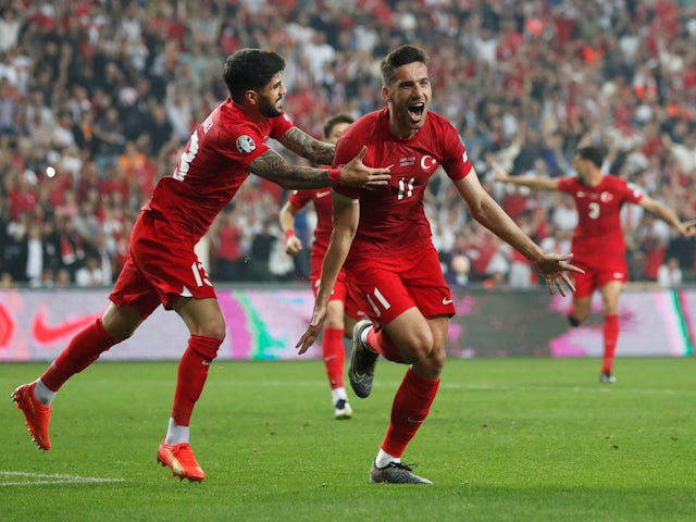 Turkey's Mehmet Umut Nayir celebrates scoring their first goal with Evren Eren Elmaci on June 19, 2023