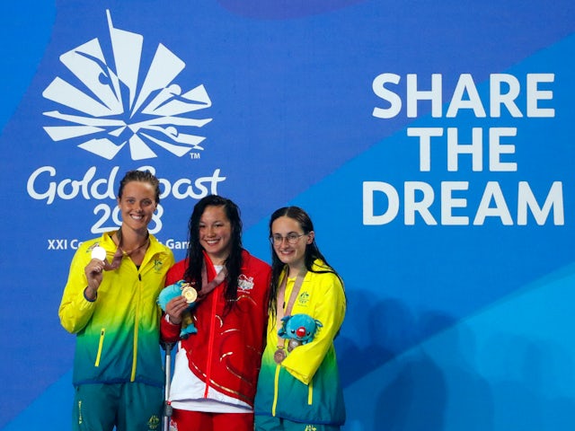 Gold medalist Alice Tai of England, silver medalist Ellie Cole of Australia and bronze medalist Ashleigh McConnell of Australia at the 2018 Commonwealth Games on April 6, 2018