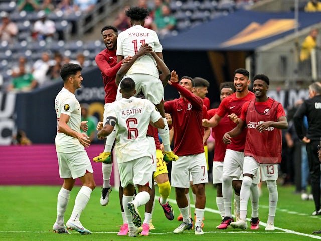 Qatar forward Yusuf Abdurisag (11) celebrates his goal with teammates on June 25, 2023
