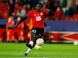 Timothy Weah warms up for Lille in November 2021