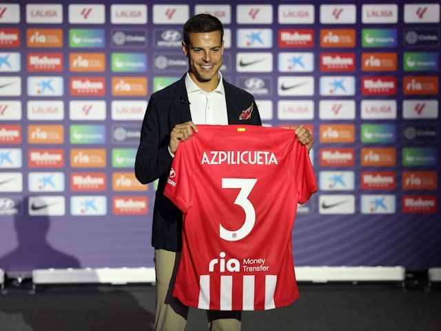 Atletico Madrid new signing Cesar Azpilicueta poses with a club shirt during his unveiling on July 7, 2023