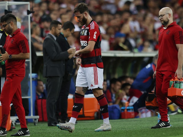 Flamengo's Leo Pereira leaves the pitch after sustaining an injury on July 1, 2023
