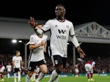 Fulham's Neeskens Kebano celebrates after Aston Villa's Tyrone Mings scored an own goal on October 20, 2022