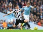Newcastle United's Sven Botman in action with Manchester City's Kevin De Bruyne on March 4, 2023