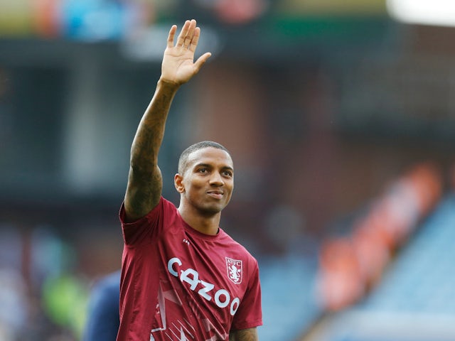 Aston Villa's Ashley Young acknowledges fans during the lap of appreciation on May 28, 2023
